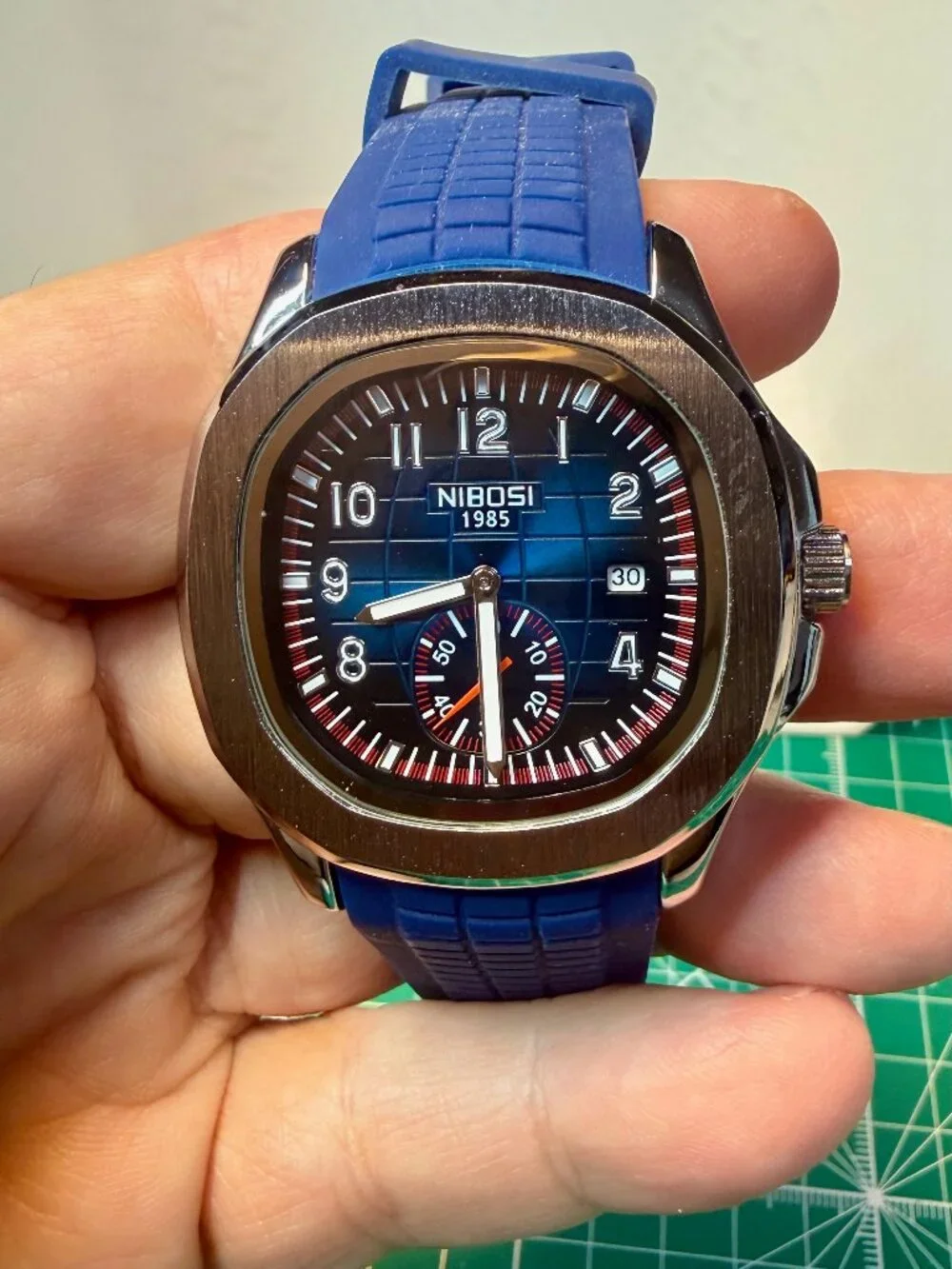 Nibosi Blue face stanless watch silicone band quarts 3Bar
